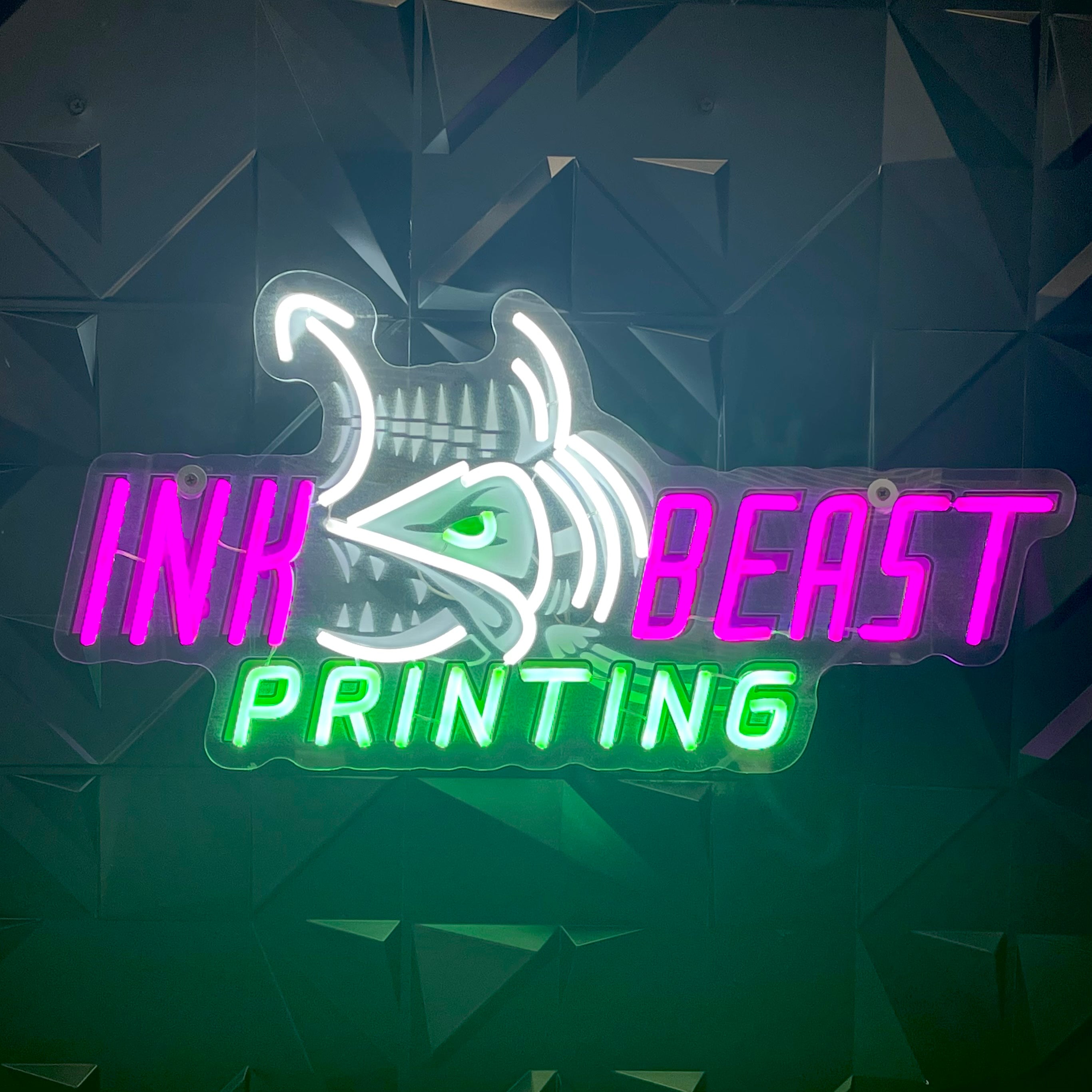 Custom neon sign of the Ink Beast Printing logo